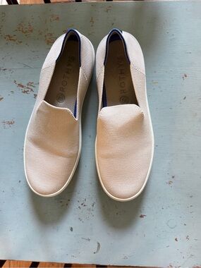 Rothy's Slip-On Sneakers in Light Beige with Blue Accent